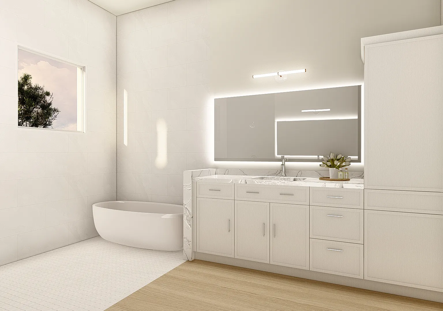 A vanity run in the Coastal Collection primary bath - a marble-look counter under a backlit mirror, with the freestanding tub beyond