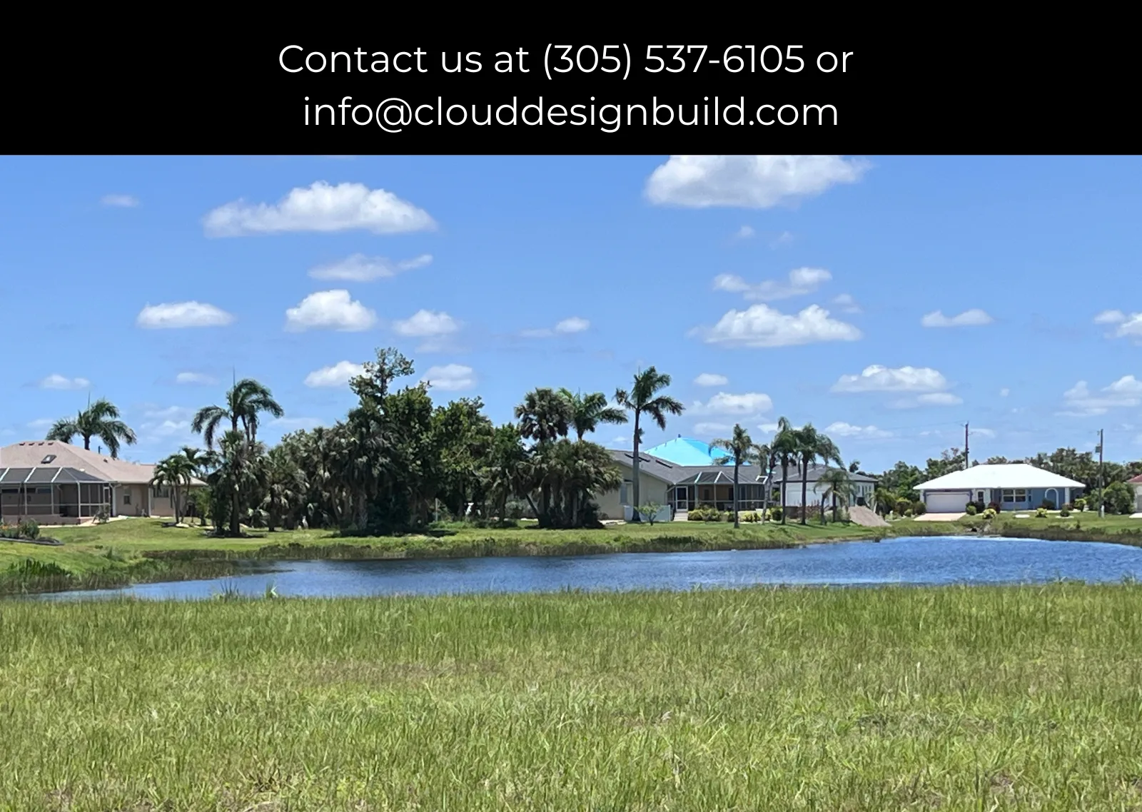 Waterfront homes with palm trees along a pond in a Punta Gorda neighborhood